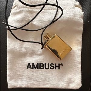 AMBUSH gold bottle perfume pendant. Extremely rare to find item. High end brand